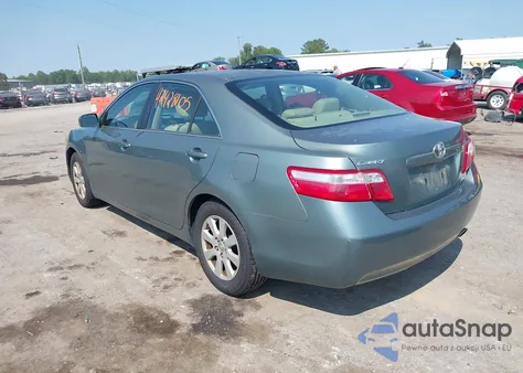 2007 Toyota Camry Xle z USA, uszkodzony, nr VIN JTNBE46KX73009173
